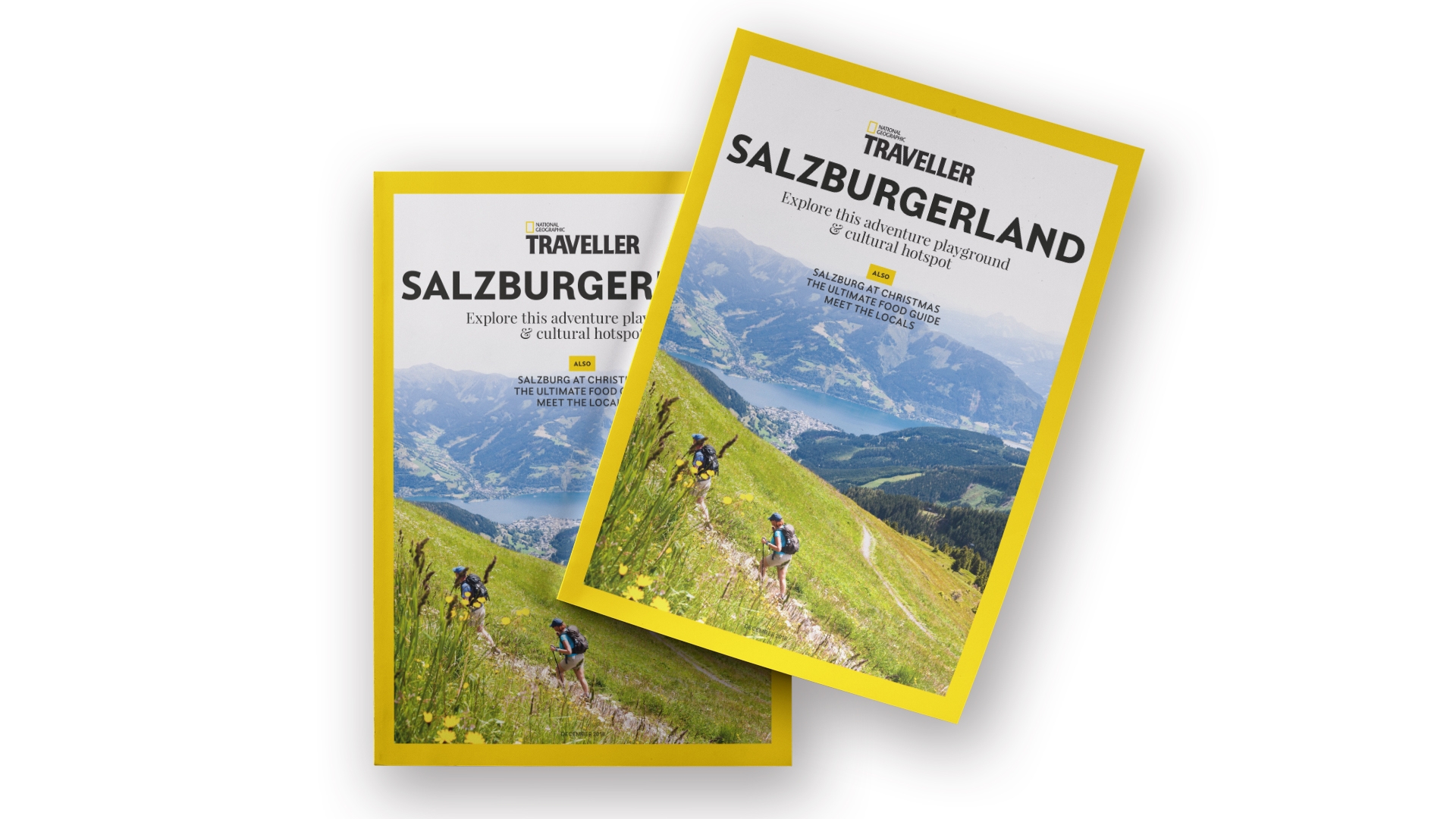 Zwei National Geographic Traveller Magazine mit dem Titel Salzburgerland mit einem Wanderer auf einem Bergpfad.